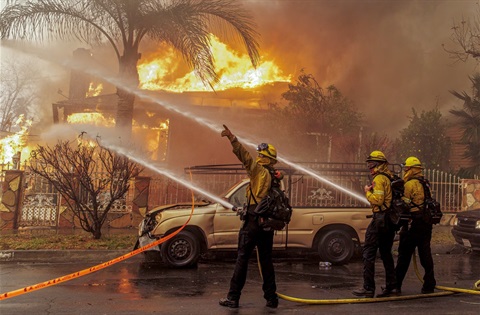 Firemen putting out fire.