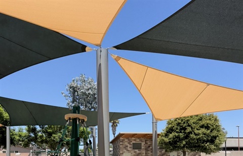 Picture of the shade structure and playground at Richmar Park